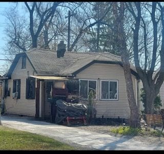 28530 Fairfax St, Southfield, MI 48076 - back of house featuring a chimney