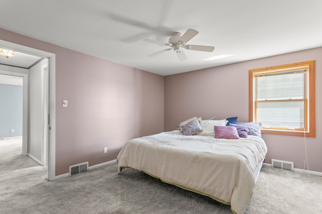 bedroom with carpet floors and visible vents