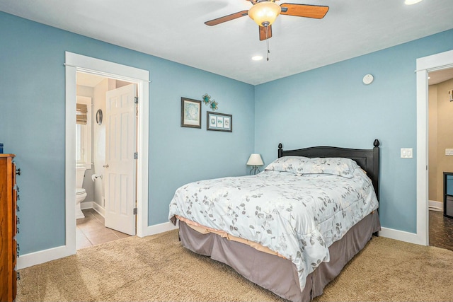 1332 Fluorite Ave, Zeeland, MI 49464 - bedroom with ceiling fan, carpet floors, baseboards, and ensuite bathroom