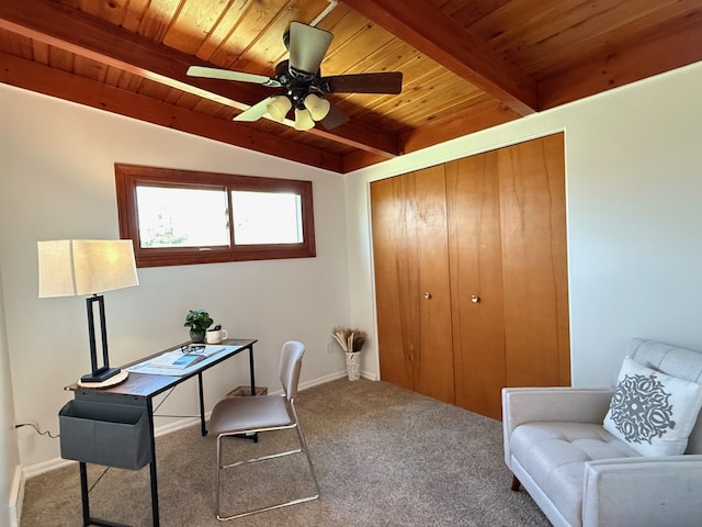carpeted office space featuring baseboards, vaulted ceiling with beams, wood ceiling, and a ceiling fan