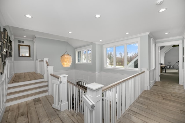 46815 Elizabeth Ln, Decatur, MI 49045 - corridor featuring an upstairs landing, wainscoting, recessed lighting, a decorative wall, and light wood finished floors