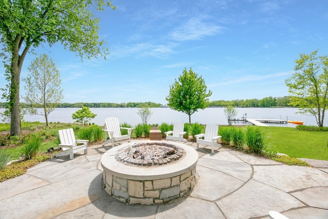46815 Elizabeth Ln, Decatur, MI 49045 - view of patio with a fire pit and a water view