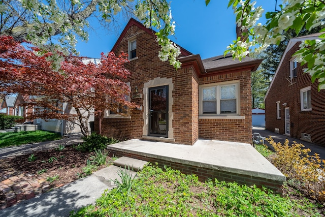 view of front of property featuring brick siding
