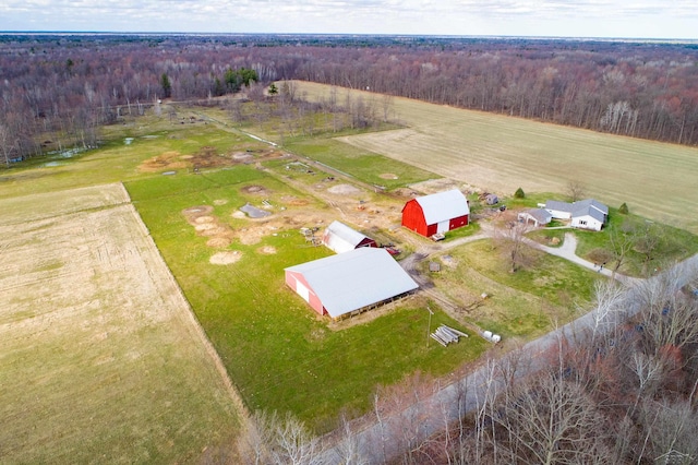 drone / aerial view with a forest view and a rural view