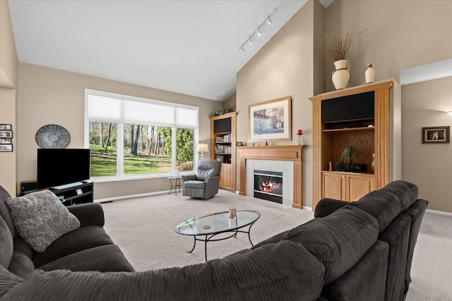 4435 Driftwood Dr, Commerce Twp, MI 48382 - living room featuring carpet floors, a fireplace, and high vaulted ceiling