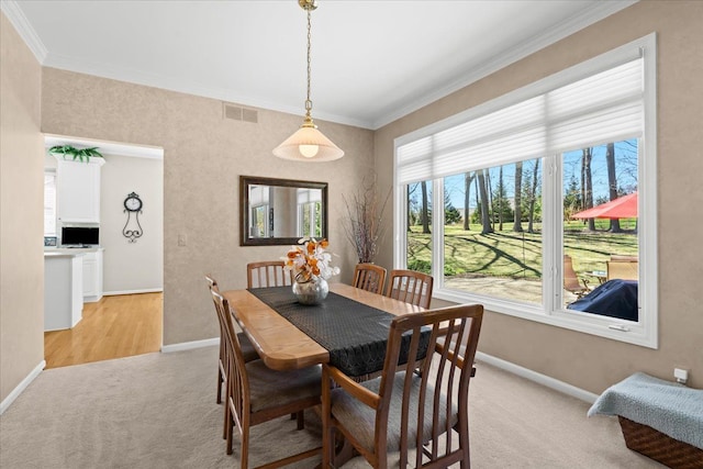 4435 Driftwood Dr, Commerce Twp, MI 48382 - dining room with light colored carpet and crown molding