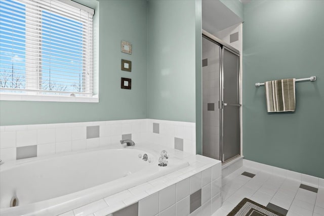 4435 Driftwood Dr, Commerce Twp, MI 48382 - bathroom with a shower stall, a bath, and tile patterned floors