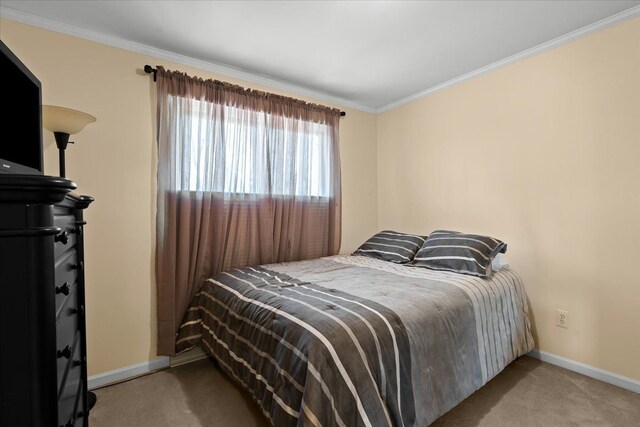 4435 Driftwood Dr, Commerce Twp, MI 48382 - bedroom with carpet flooring and crown molding