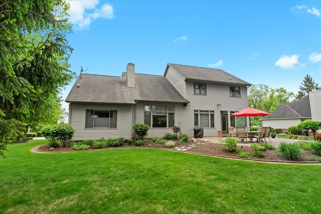 4435 Driftwood Dr, Commerce Twp, MI 48382 - rear view of house featuring a lawn, a chimney, and a patio area