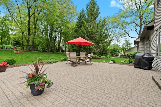 4435 Driftwood Dr, Commerce Twp, MI 48382 - view of patio with a grill and outdoor dining area