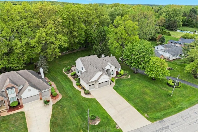 4435 Driftwood Dr, Commerce Twp, MI 48382 - view of subject property featuring a heavily wooded area