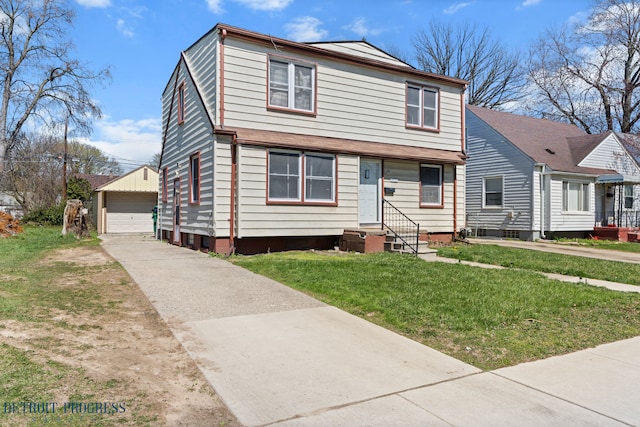 14725 Agnes Ave, Eastpointe, MI 48021 - view of front of property with an outbuilding, a garage, entry steps, and a front yard