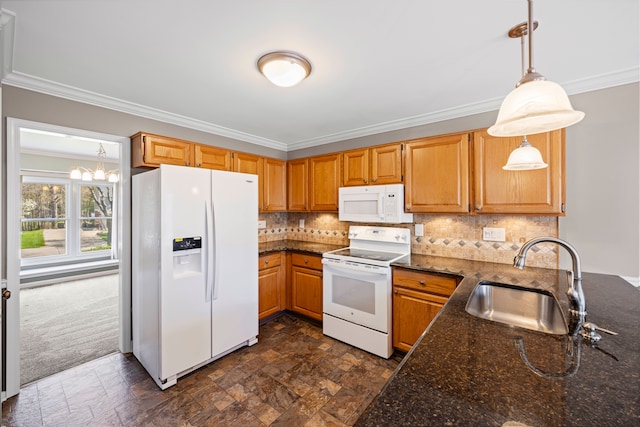 kitchen featuring decorative backsplash, ornamental molding, white appliances, a chandelier, and a sink
