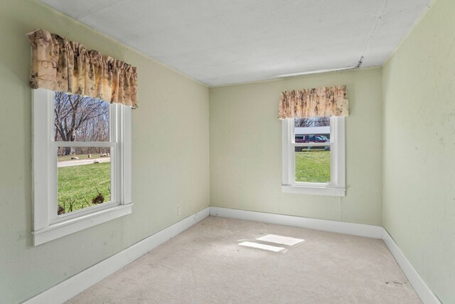 3931 S Shore Dr, Lapeer, MI 48446 - unfurnished room featuring carpet floors and baseboards