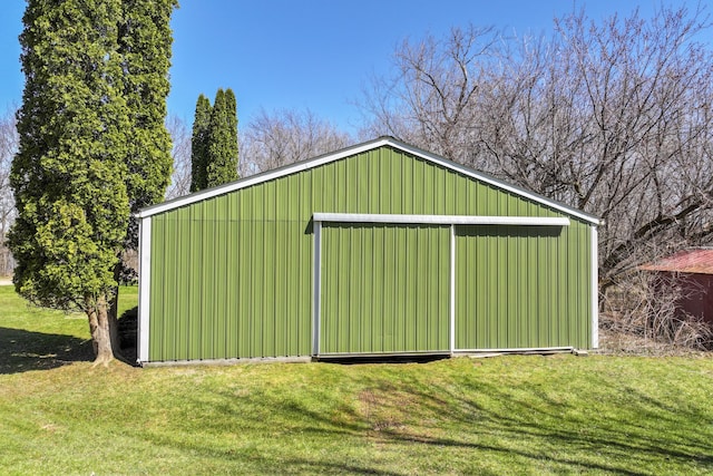 3931 S Shore Dr, Lapeer, MI 48446 - view of pole building with a lawn