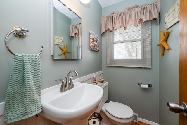 1601 Barbara Ann Dr, Stevensville, MI 49127 - bathroom featuring visible vents, a sink, and toilet