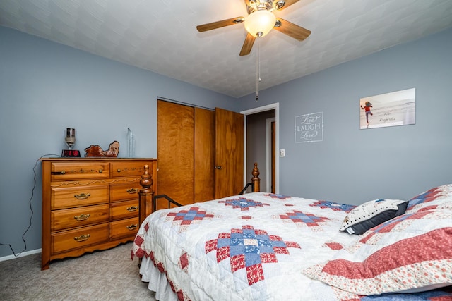 1601 Barbara Ann Dr, Stevensville, MI 49127 - bedroom featuring light colored carpet, baseboards, a ceiling fan, and a closet