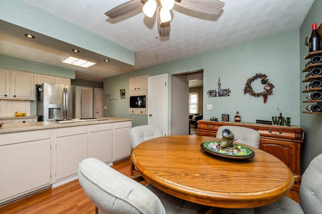 1601 Barbara Ann Dr, Stevensville, MI 49127 - dining area featuring recessed lighting, light wood-style floors, and ceiling fan