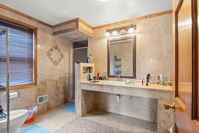 bathroom featuring toilet, walk in shower, visible vents, and tile walls