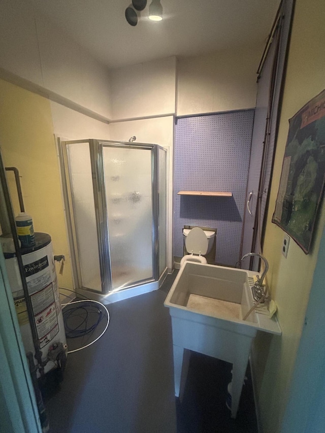 59650 White Wood Dr, Mattawan, MI 49071 - bathroom featuring gas water heater and a stall shower