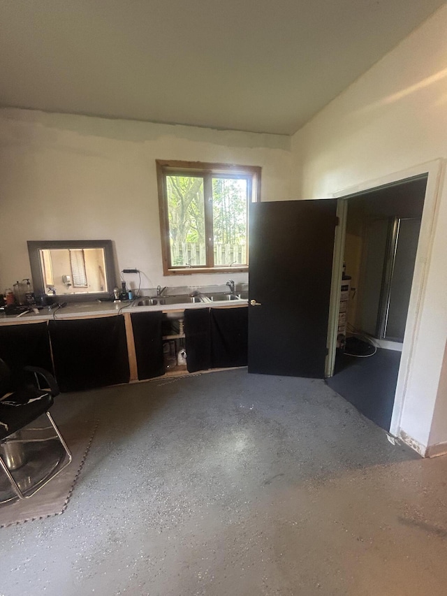 59650 White Wood Dr, Mattawan, MI 49071 - kitchen featuring dark cabinetry and light countertops