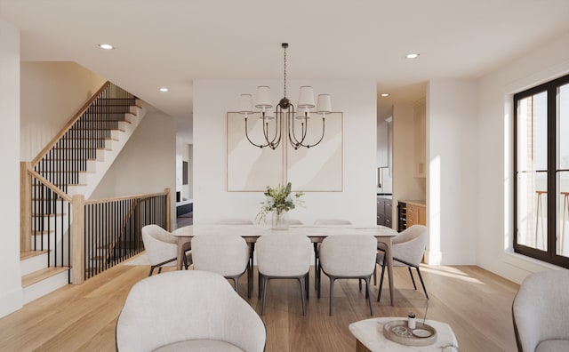 dining room with a chandelier, light wood finished floors, stairway, recessed lighting, and baseboards