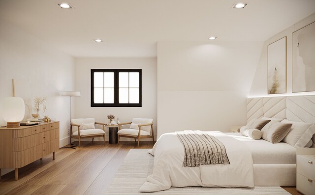 bedroom with light wood-style flooring and recessed lighting