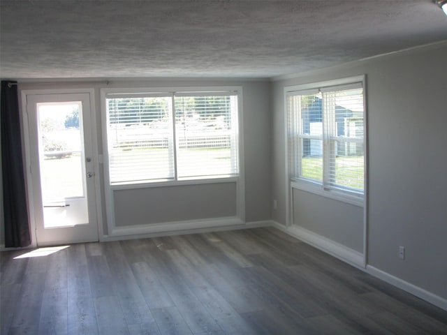 9920 Sashabaw Rd, Clarkston, MI 48348 - unfurnished room with baseboards and wood finished floors