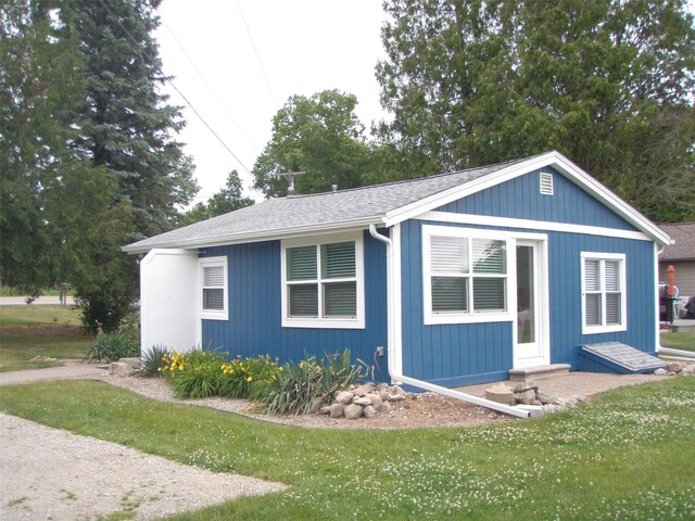 9920 Sashabaw Rd, Clarkston, MI 48348 - exterior space with entry steps and a front yard