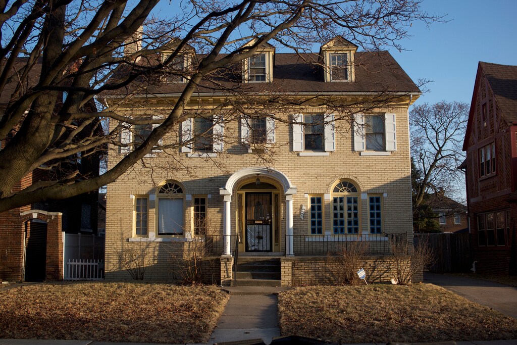 2225 Edison St, Detroit, MI 48206 - view of front of property with brick siding and fence