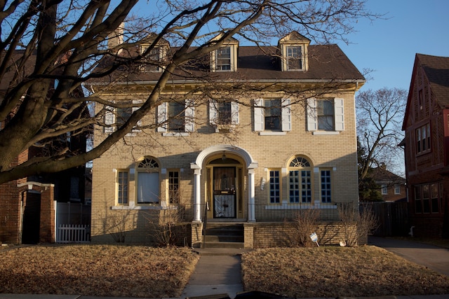 2225 Edison St, Detroit, MI 48206 - view of front of property with brick siding and fence