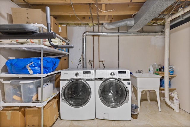 laundry area with washer and dryer and laundry area