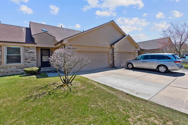 ranch-style house featuring a shingled roof, driveway, brick siding, a front yard, and a garage