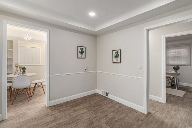 8911 Plainview Ave, Detroit, MI 48228 - empty room featuring baseboards, wood finished floors, and visible vents