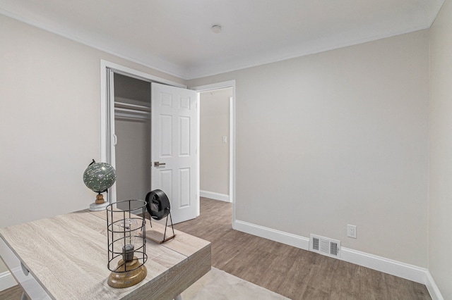 8911 Plainview Ave, Detroit, MI 48228 - home office with baseboards, wood finished floors, and visible vents