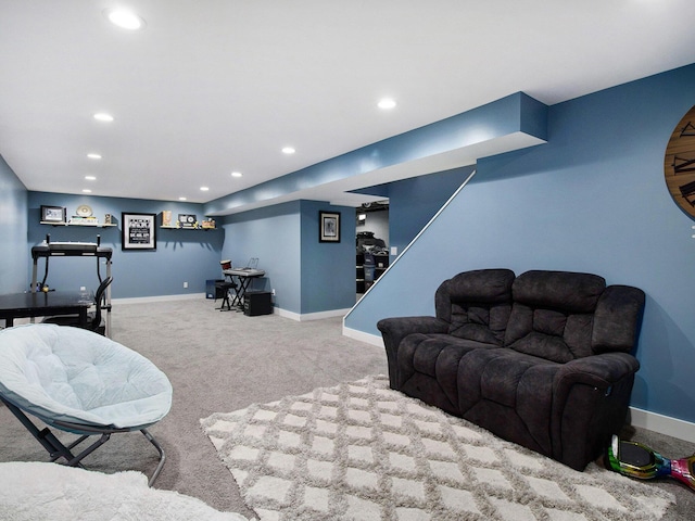 carpeted living room featuring recessed lighting and baseboards
