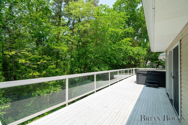 6817 Martin View St NE, Rockford, MI 49341 - wooden deck featuring a hot tub