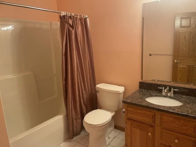 full bathroom featuring shower / bath combination with curtain, tile patterned floors, vanity, and toilet