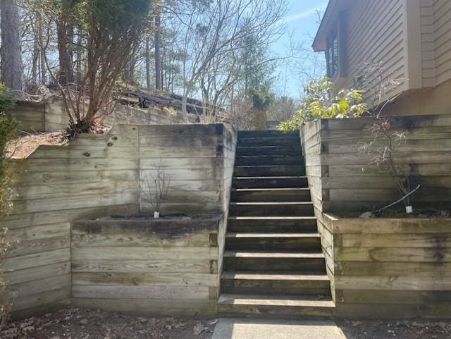 view of gate with stairway