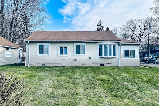 34038 Caseville Ct, Westland, MI 48186 - rear view of property featuring crawl space, roof with shingles, and a yard