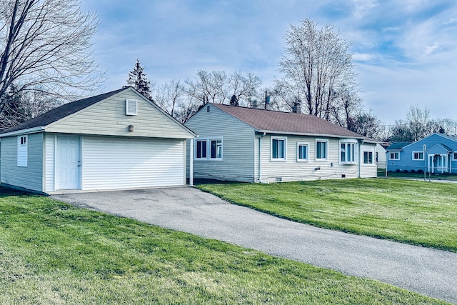 34038 Caseville Ct, Westland, MI 48186 - ranch-style home with a front lawn, an outdoor structure, and a detached garage