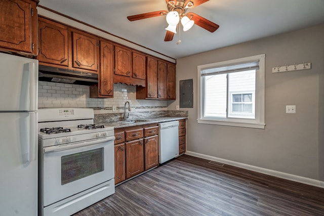34038 Caseville Ct, Westland, MI 48186 - kitchen featuring a sink, white appliances, backsplash, baseboards, and under cabinet range hood