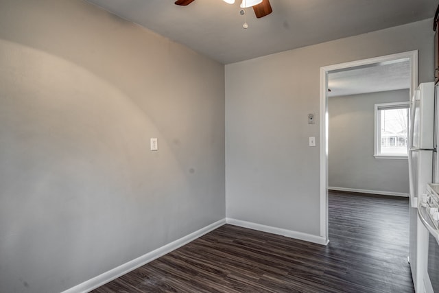 34038 Caseville Ct, Westland, MI 48186 - unfurnished room with dark wood finished floors, baseboards, and ceiling fan