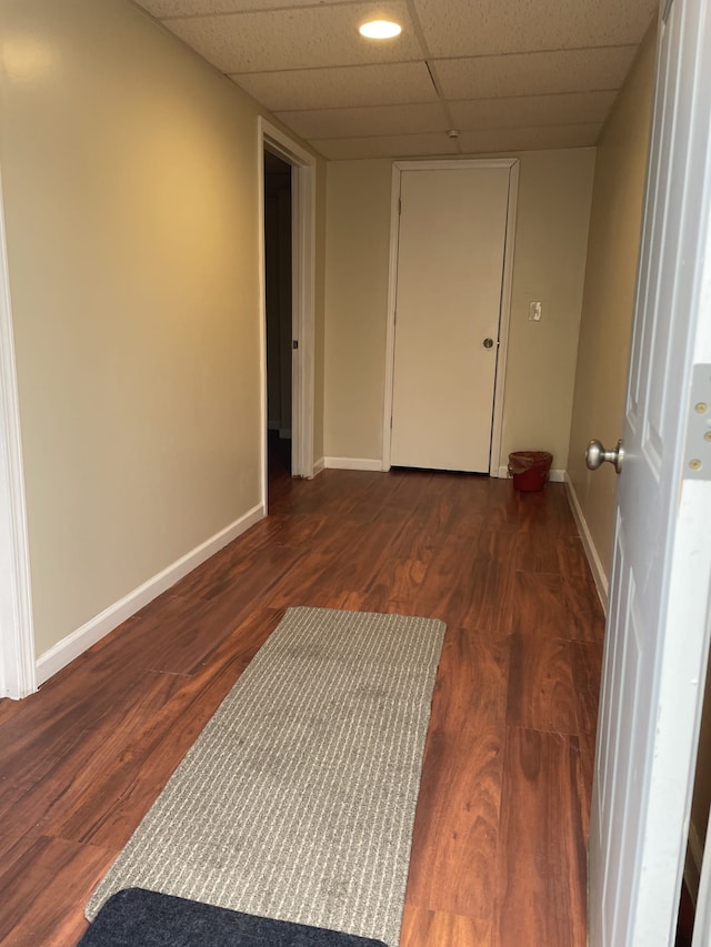 34038 Caseville Ct, Westland, MI 48186 - hallway featuring dark wood-style flooring, baseboards, and a drop ceiling