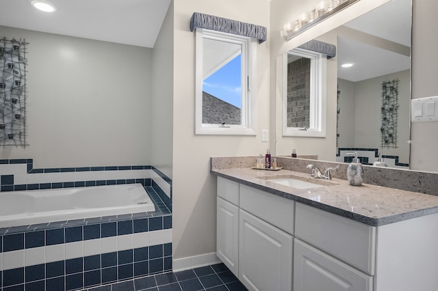 full bathroom featuring a bath, vanity, baseboards, tile patterned flooring, and recessed lighting