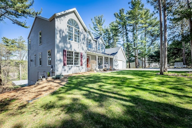 view of front of home featuring a porch and a front lawn