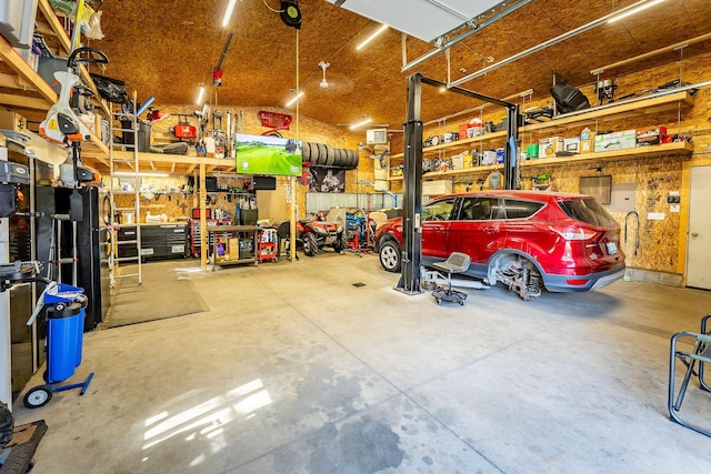 garage with a workshop area