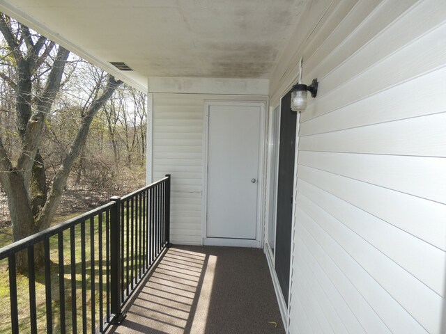 balcony featuring visible vents