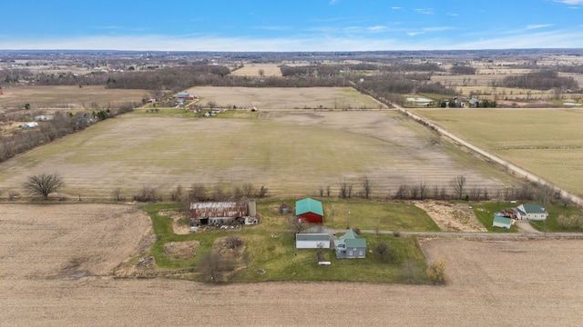 birds eye view of property with a rural view