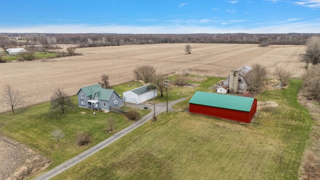 birds eye view of property featuring a rural view
